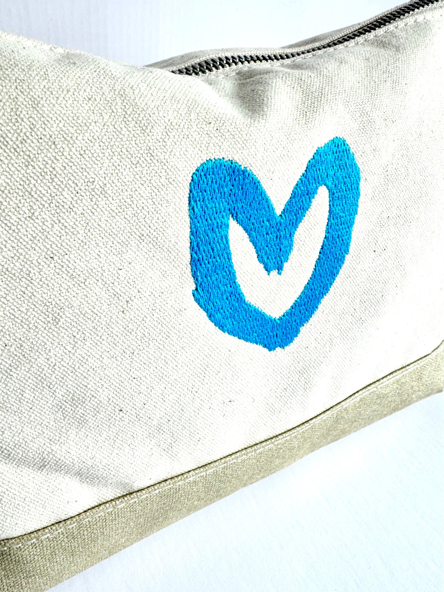 carrie song x tms heart travel pouch (gold w/ turq heart)